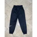 Buy Nike Cloth trousers online