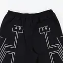 Buy Marcelo Burlon Trousers online