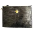 Crocodile clutch bag Versace