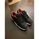 Buy JORDAN Air Jordan 11 leather trainers online