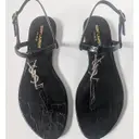 Buy Saint Laurent Cassandra leather flip flops online