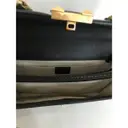 Cat Lock leather handbag Gucci