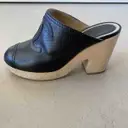 Leather mules & clogs Chanel