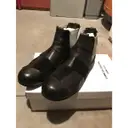 Buy Comme Des Garcons Leather boots online