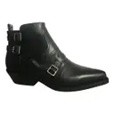 Diorsaddle leather buckled boots Dior