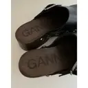 Buy Ganni Leather mules & clogs online