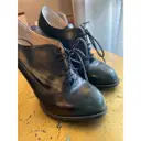 Buy Giuseppe Zanotti Leather lace up boots online