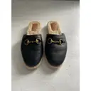 Buy Gucci Leather mules online