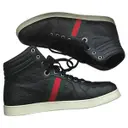 LEATHER HIGH TOP TRAINERS. Gucci