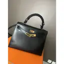 Kelly 28 leather crossbody bag Hermès - Vintage
