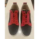 Buy Christian Louboutin Louis junior spike leather low trainers online