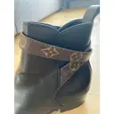 Leather buckled boots Louis Vuitton