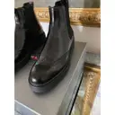 Buy Prada Monolith leather ankle boots online