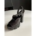 Buy Prada Monolith leather sandals online