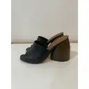 Buy Neous Leather mules & clogs online