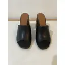 Leather mules & clogs Neous