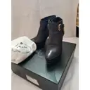 Leather buckled boots Prada
