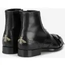 Queercore leather boots Gucci