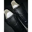 Buy Maison Martin Margiela Replica leather low trainers online