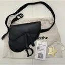 Buy Dior Saddle leather clutch bag online