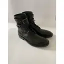Buy Saint Laurent Leather buckled boots online