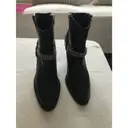 Saint Laurent Leather buckled boots for sale