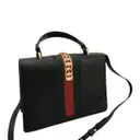 Buy Gucci Sylvie Top Handle leather handbag online
