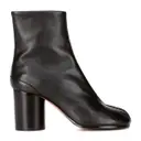 Buy Maison Martin Margiela Tabi leather ankle boots online