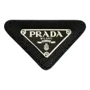 Triangolo leather pin & brooche Prada