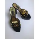 Buy Versace Leather mules online