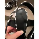 Leather sandals Versus