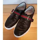 Buy Gucci Web leather trainers online