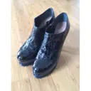 Alaïa Patent leather ankle boots for sale