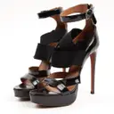 Buy Alaïa Patent leather sandals online