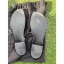Cassandra patent leather flip flops Saint Laurent
