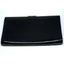 Buy Yves Saint Laurent Chyc patent leather clutch bag online