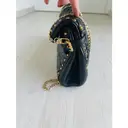 Matelassé patent leather bag Miu Miu
