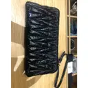 Buy Miu Miu Patent leather clutch bag online
