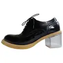 Patent leather lace ups MM6