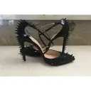 Nosy Spikes patent leather heels Christian Louboutin