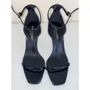 Buy Saint Laurent Opyum patent leather sandals online