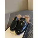 Buy Gucci Princetown patent leather flats online