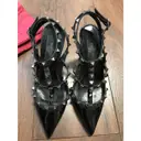 Buy Valentino Garavani Rockstud patent leather heels online