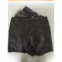 Buy Saint Laurent Patent leather mini skirt online