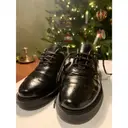 Buy Tod's Patent leather lace ups online