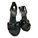 Patent leather sandals Yves Saint Laurent