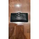 Buy Yves Saint Laurent Patent leather wallet online - Vintage
