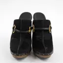 Buy Gucci Pony-style calfskin mules & clogs online