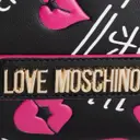 Buy Moschino Love Clutch bag online