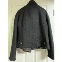 Buy Chanel La Petite Veste Noire tweed jacket online